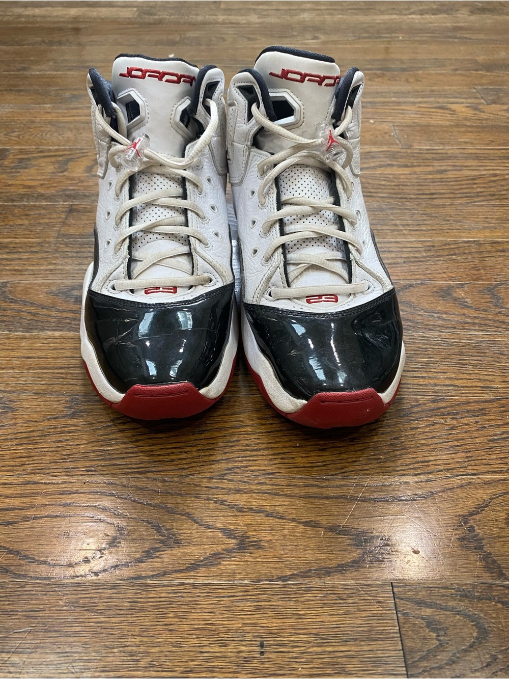 Air Jordan 11’s “white black red”